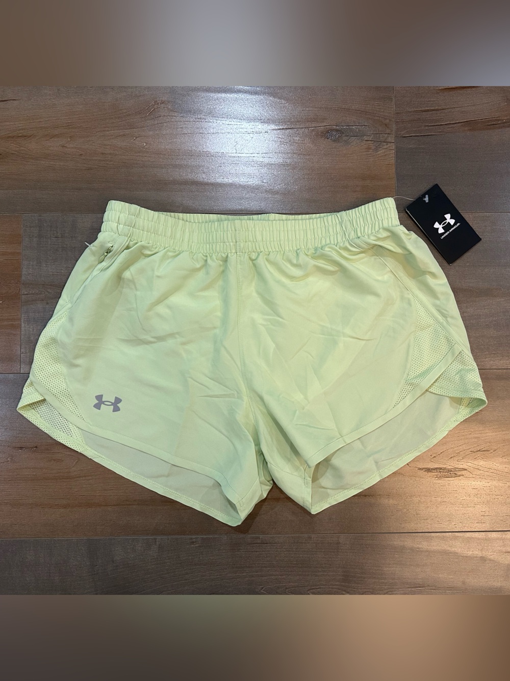 Under Armour Women’s lime Athletic Shorts